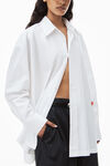 alexander wang white button up boyfriend shirt in compact cotton with apple logo patch